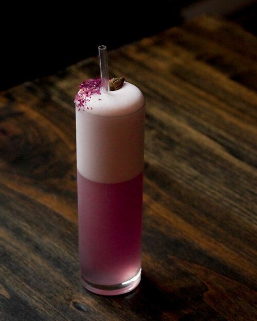 A light and floral gin fizz using Purple Blossom Gin with hints of rose and lavender and soft purple hue